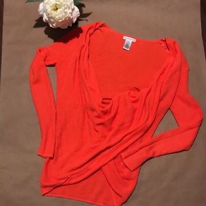 Bright orange sweater